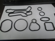 Прокладка корпуса масляного фильтра 55354071 Комплект на Авео Круз Астра F18D4, Z18XER, - Dominant-2