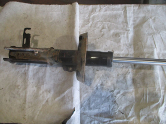 Амортизатор передний Шевроле Круз Опель Астра J левый 13354022 газомасляный - БУ