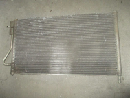 Радиатор кондиционера Форд Фокус 1 - 1062380 XS4H19710BA 1,4-2,0л - 3 ряда сот отслаиваются - БУ