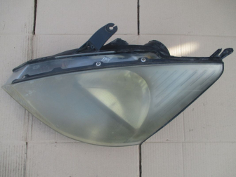 Фара левая YS4X13006 YS4Z13008KC Форд Фокус 1 USA до 2005 г механический корректор, - БУ