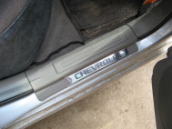 Накладка порога заднего правого 96838938, 95392579 96555529 Шевроле Лачетти - Хромированная, - БУ