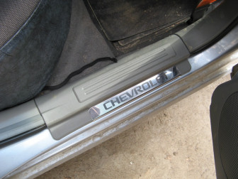 Накладка порога заднего правого 96838938, 95392579 96555529 Шевроле Лачетти - Хромированная, - БУ