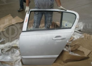 Дверь задняя левая Опель Астра H Хэтчбек 94710105 - Голая - БУ Серая вмятинка