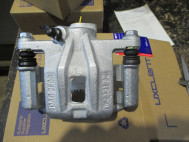 Суппорт задний Шевроле Лачетти левый 96800085, 96463798, 96549622 - Uxclent - со скобой