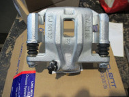 Суппорт задний Шевроле Лачетти правый 96800086, 96549623, 96463799, 96418880 - Uxclent - со скобой