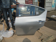 Дверь Ниссан Тиида задняя левая N17X Верса Седан с 2011г H21533BAMB, - БУ Серебро в сборе