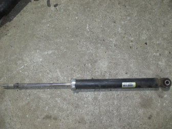 Амортизатор задний 562103AN0C Тиида N17X Versa Mach Micra K13 Sunny Sentra Almera N17 -БУ