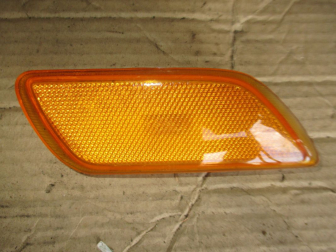 Катафот бампера переднего правый 2S4X15A456A Форд Фокус 1 Седан S73 - БУ