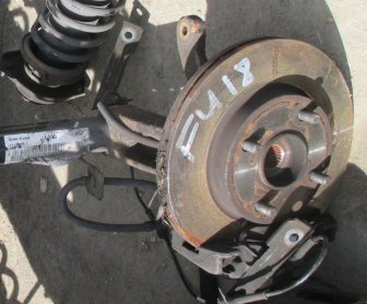 Кулак Форд Фьюжен поворотный - левый 1201774, 1203285, 1479000, - БУ в сборе со ступицей - FU-18